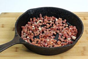 pancetta being cooked in skillet